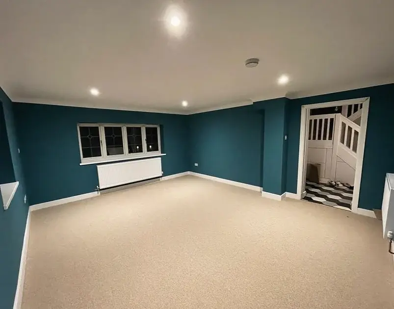 Converted garage room opening onto the hallway